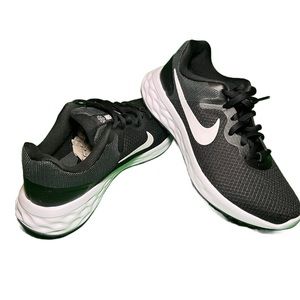 Women's Black Nike Revolution 7.5, new in box